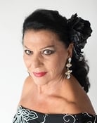 Carmen Flores (Mrs. Ortega)